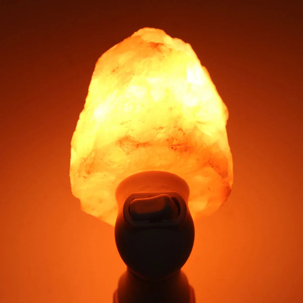Emberna Salt Glow Lamp — lifestyle on wooden nightstand