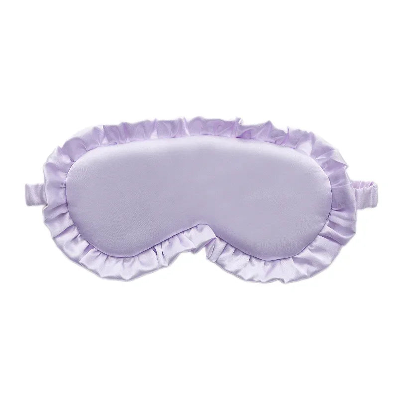 Emberna Silk Sleep Mask — woman wearing mask while resting