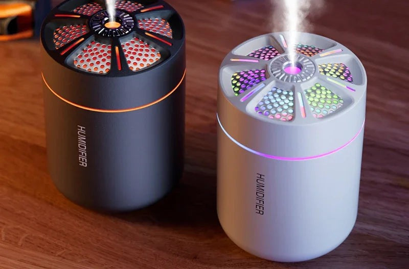 Emberna Mist Glow humidifier — black and white units with colour-changing glow